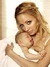 Nicole Richie s miminkem v náruči