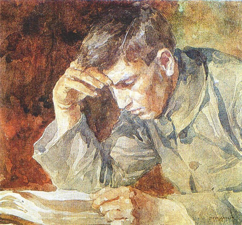 Fotografie zobrazující muže při čtení knihy